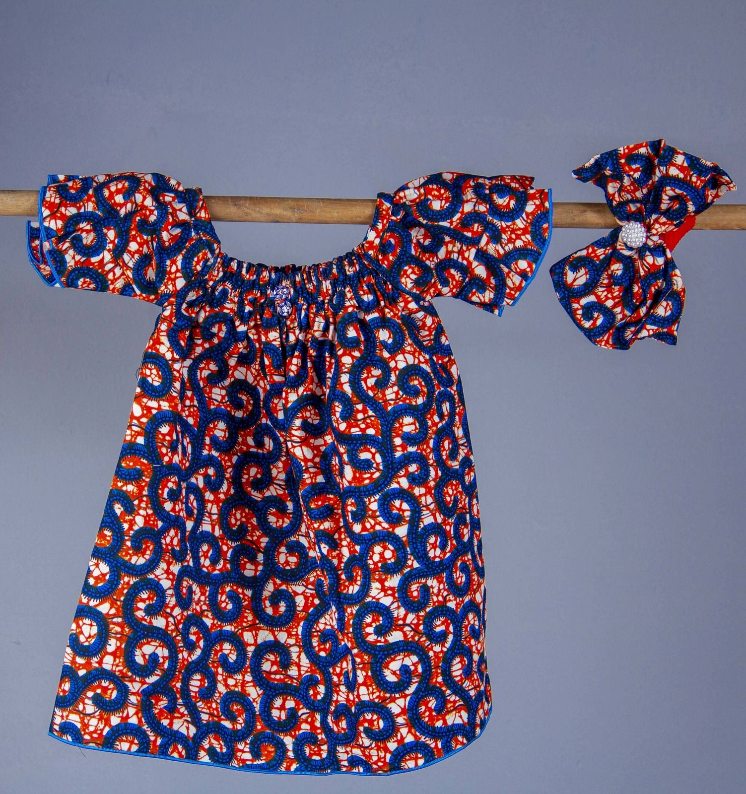 Robe pour bébé « Twist & Pop »